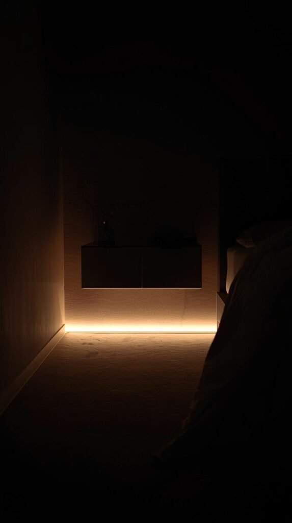 Nightstand floating above soft LED under-lighting, warm glow illuminating the floor, cozy bedroom atmosphere.