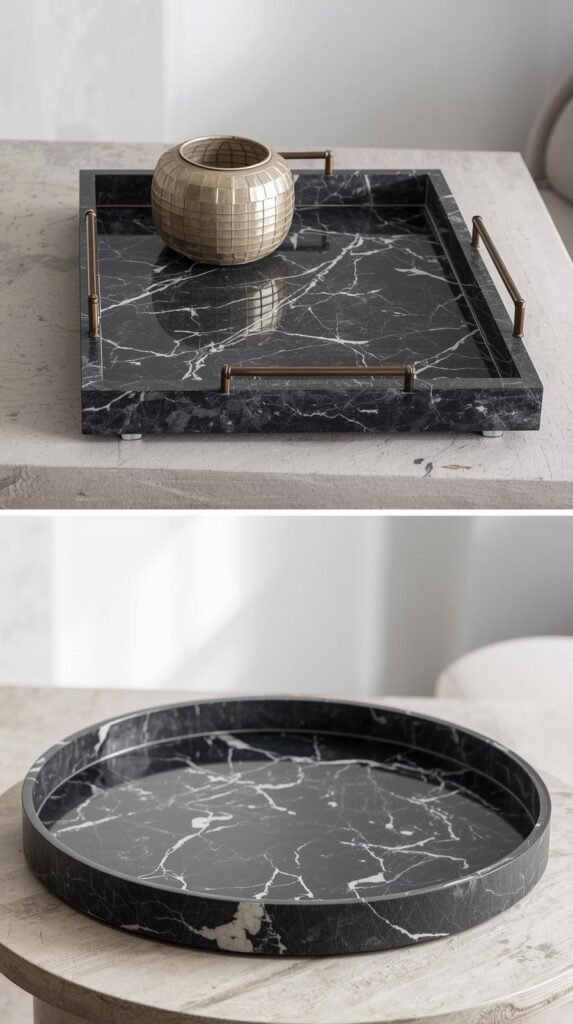 A rectangular black Calacatta marble tray on a console and a round black Calacatta marble tray on a coffee table