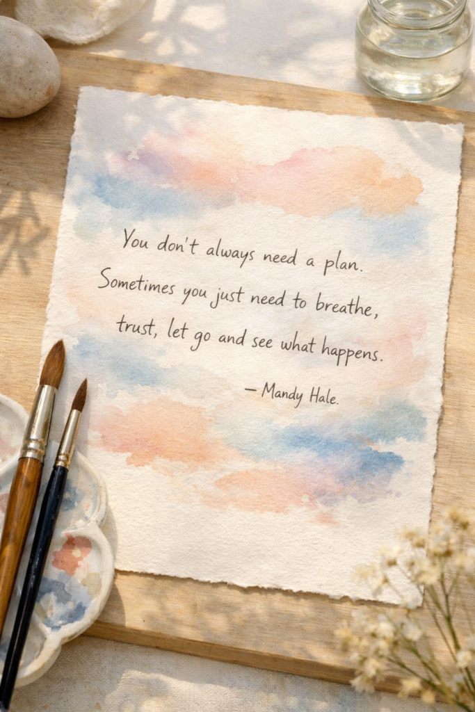 Watercolor quote art on textured paper with soft color washes.