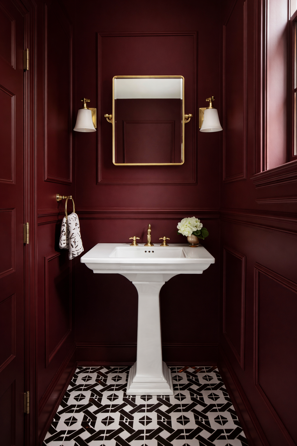 Elegant burgundy powder room design