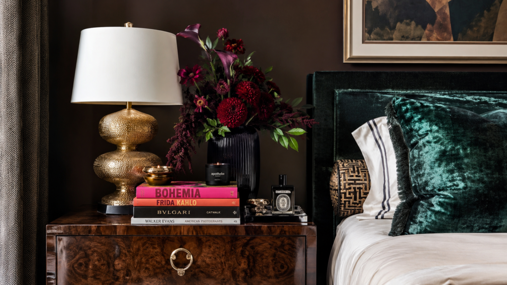 Luxurious bedroom vignette with greenery